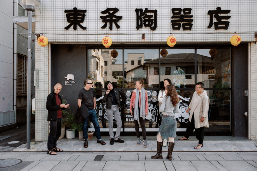 Digital nomads in Kotohira in front of Donzo beer ©Chebi Nagai