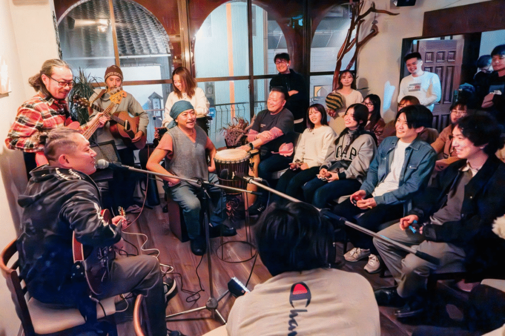 Shinji san playing music at Hemp Heart with is own band